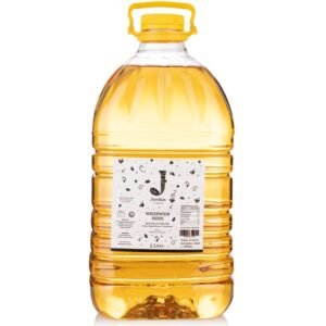 Fotografía de producto de botella de bebida amarilla. Fotografía profesional de Fotografía de botellas para impulsar ventas online para ecommerce