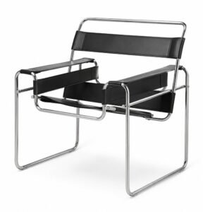 Fotografía de producto de silla lounge de diseño. Silla lounge de diseño con estructura metálica sobre fondo blanco